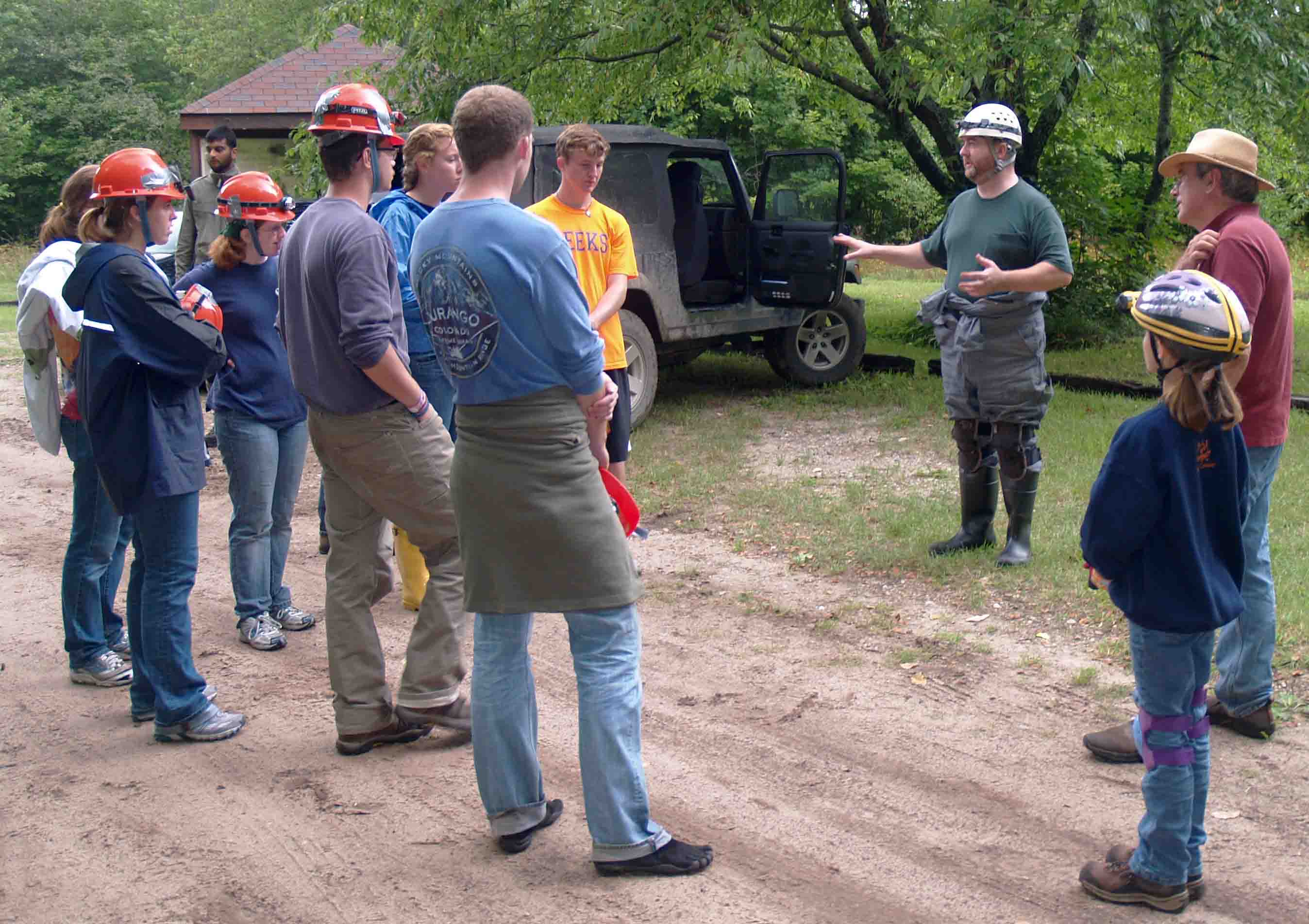 MKC Vice President Tim Deady prepares to lead a group of college students through Hendrie River Water Cave